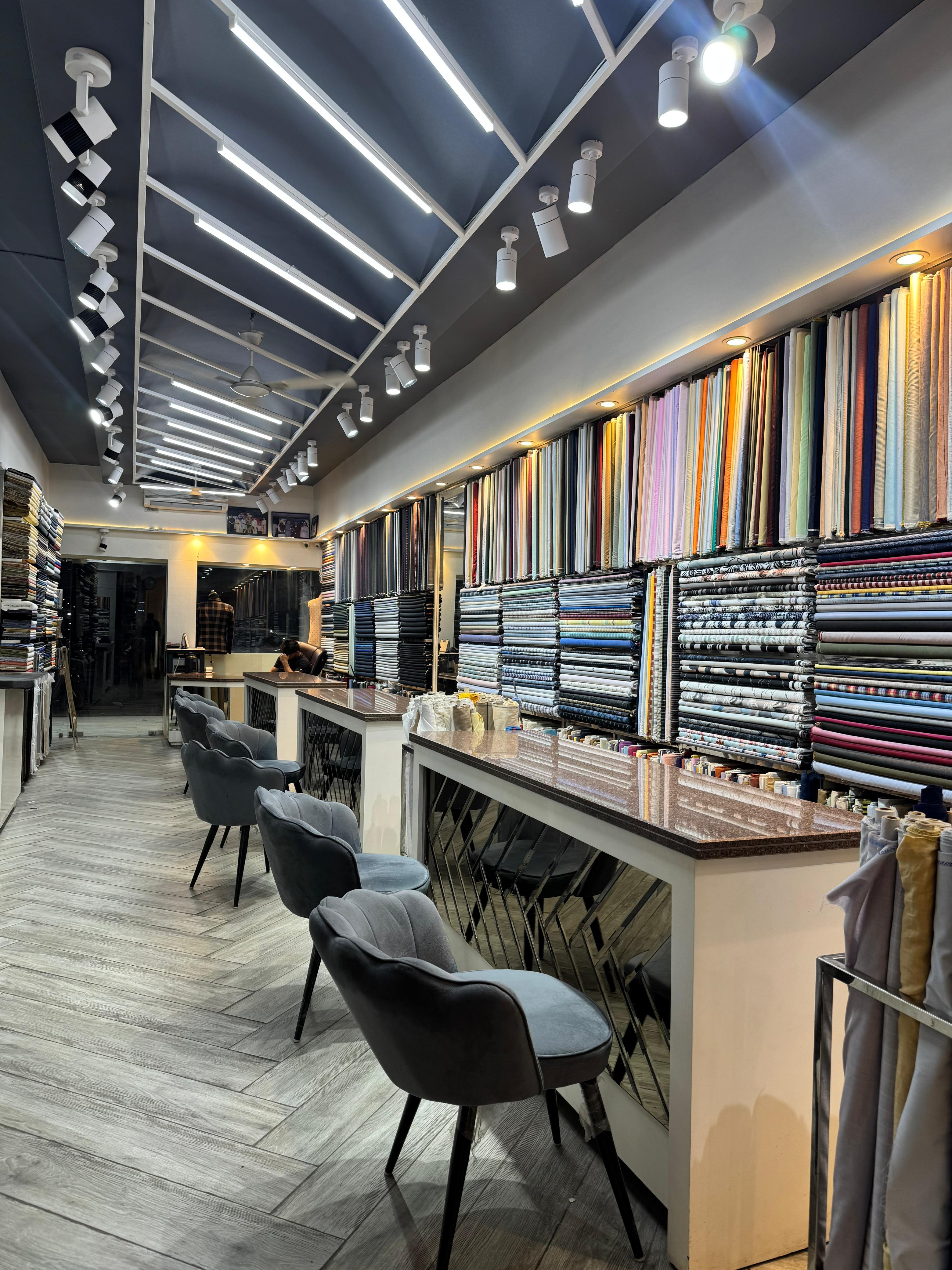 Master tailor taking measurements for a suit in Panchkula